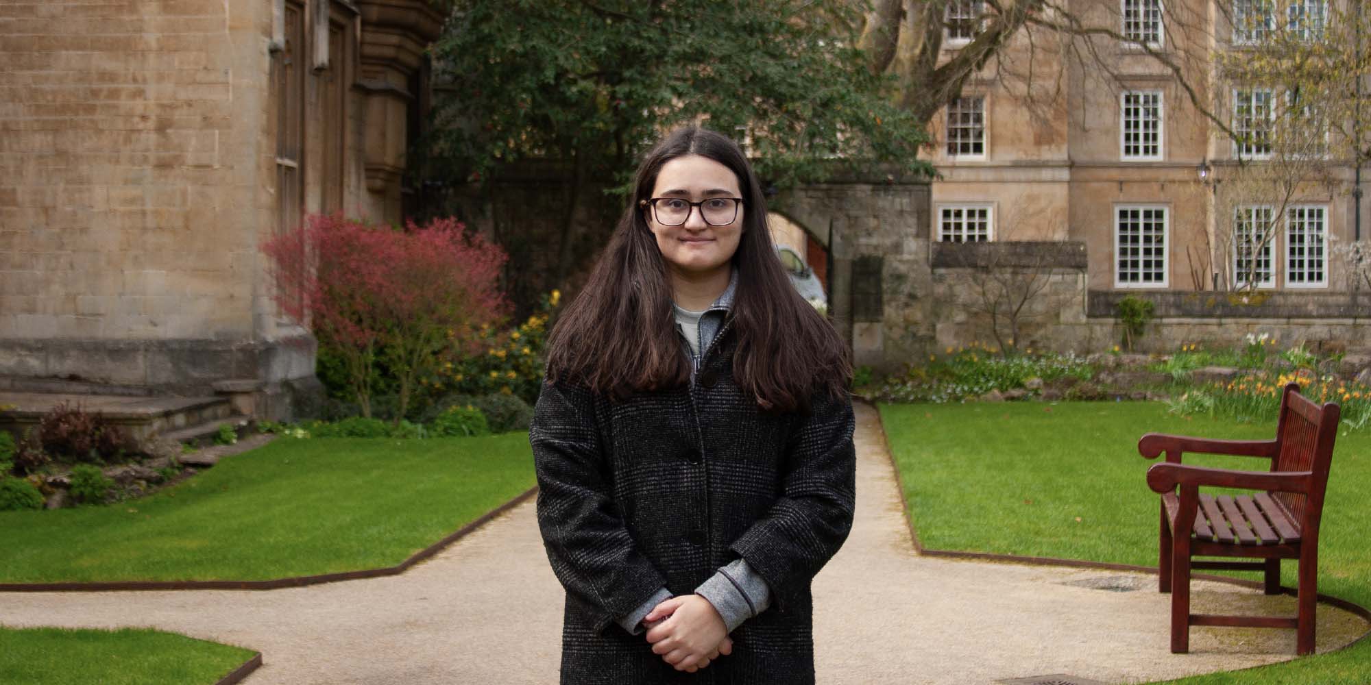 Sophia Mughal ’25 in May in front of Balliol College at the University of Oxford.