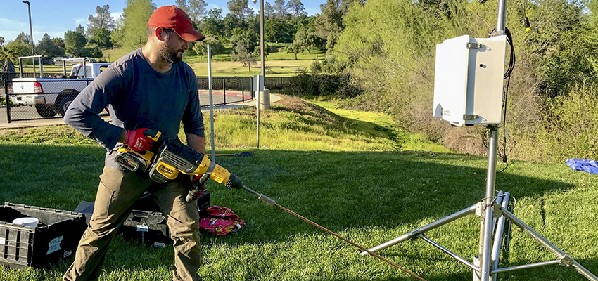 CHAD HECHT ’14 INSTALLS A WEATHER STATION AS PART OF HIS JOB AT THE CENTER FOR WESTERN WEATHER AND WATER EXTREMES.