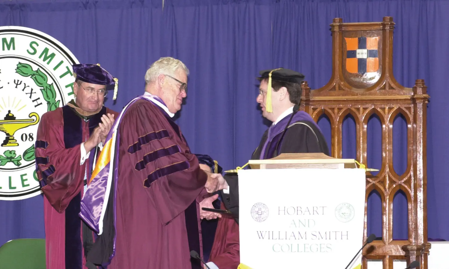 In 2006, Tom Melly (center) received an honorary degree. With him are Charles H. Salisbury Jr. ‘63, P’94, L.H.D.’08 and President Mark D. Gearan.