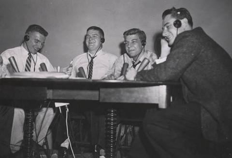 1955 photograph of four College Bowl quiz contestants: John Slayden, Warren Herendeen, Paul Minkoff, and Carl Laun