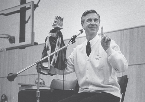 Fred Rogers wearing a Hobart and William Smith sweater.