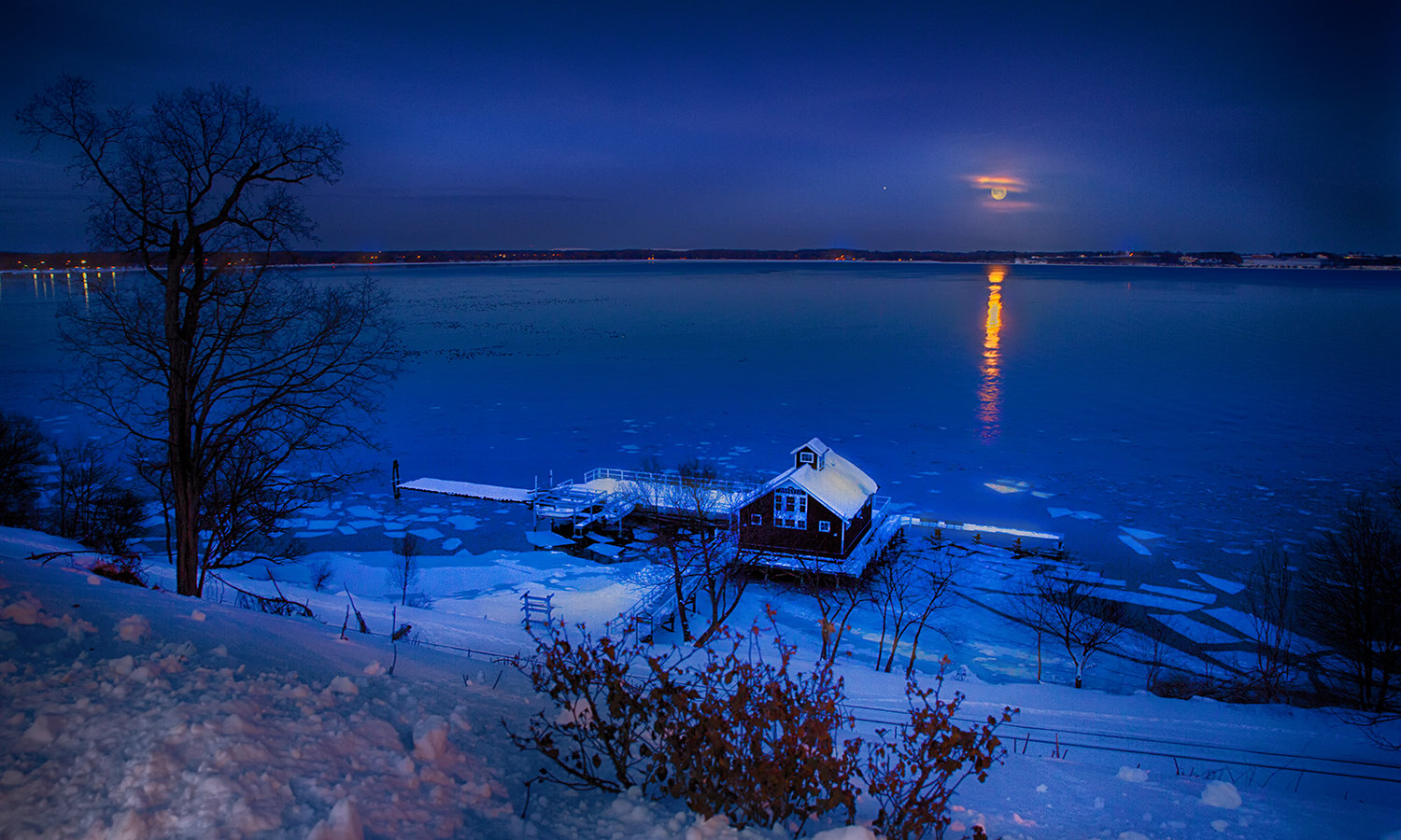 Ice forms on Seneca Lake near the Bozzuto Boathouse