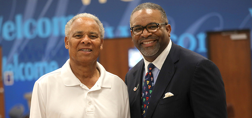 Former Hobart Basketball Coach Ed Wright and President Gregory J. Vincent 83 pose for a photo at the Geneva Boys and Girls Club.