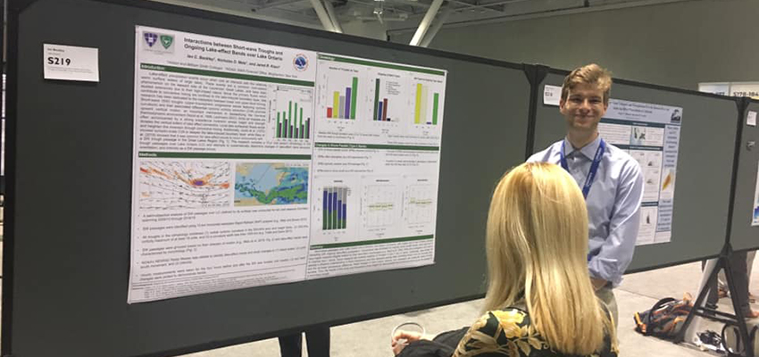 Beckley presents his research at the American Meteorological Society Conference.