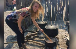 Spraggs helps prepare a meal.