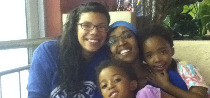 Shanelle France ’11 with her homestay family, the Lesolis.