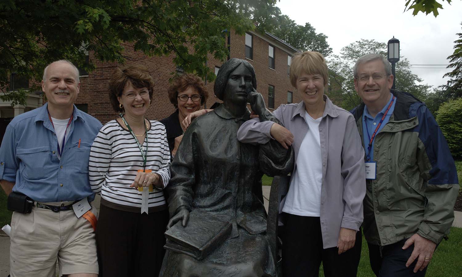 People pose with Elizabeth Blackwell statue